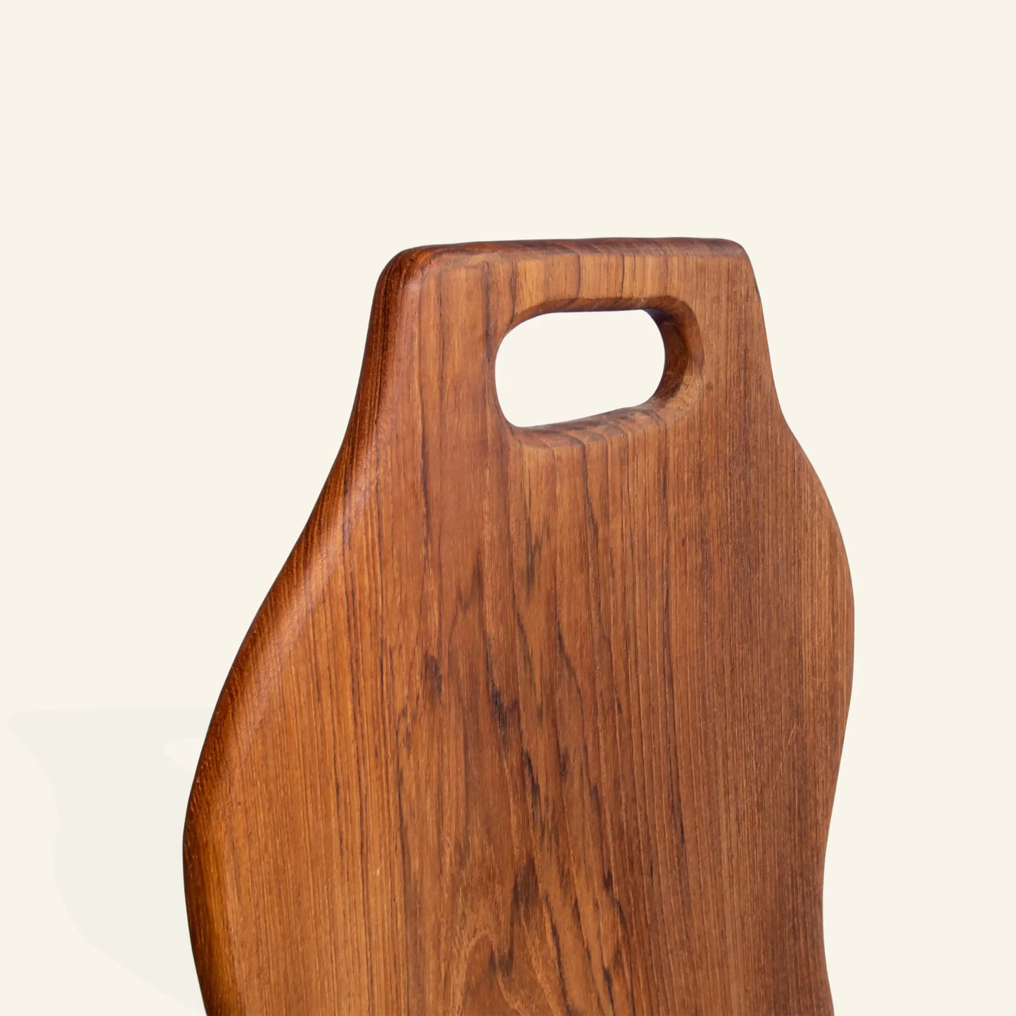 Teak wood cutting board with handle