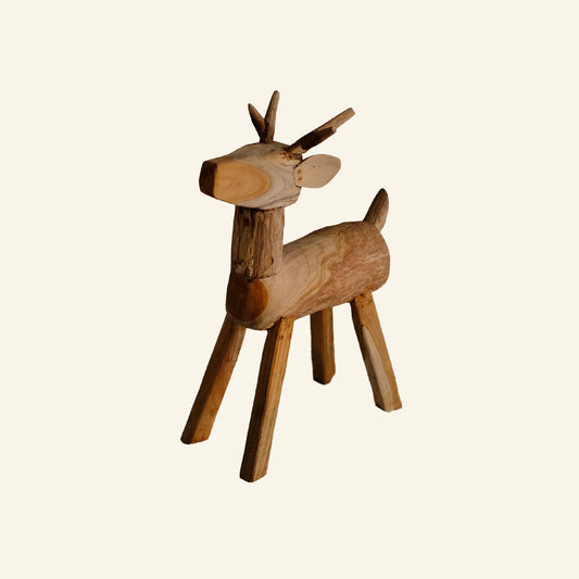 Wooden deer and teak roots