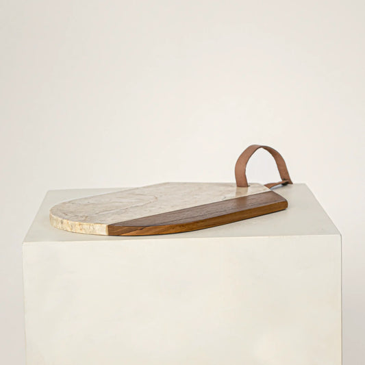 Rounded cutting board in white marble and teak wood